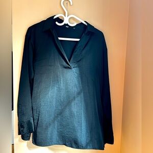 Light silky v neck blouse with long sleeves.